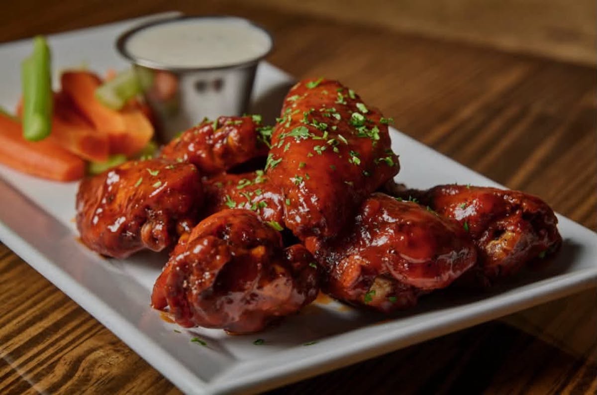 Chicken wings are a pub favorite at Ten Bells Tavern in Dallas’ Bishop Arts District. | Photo by Ten Bells Tavern