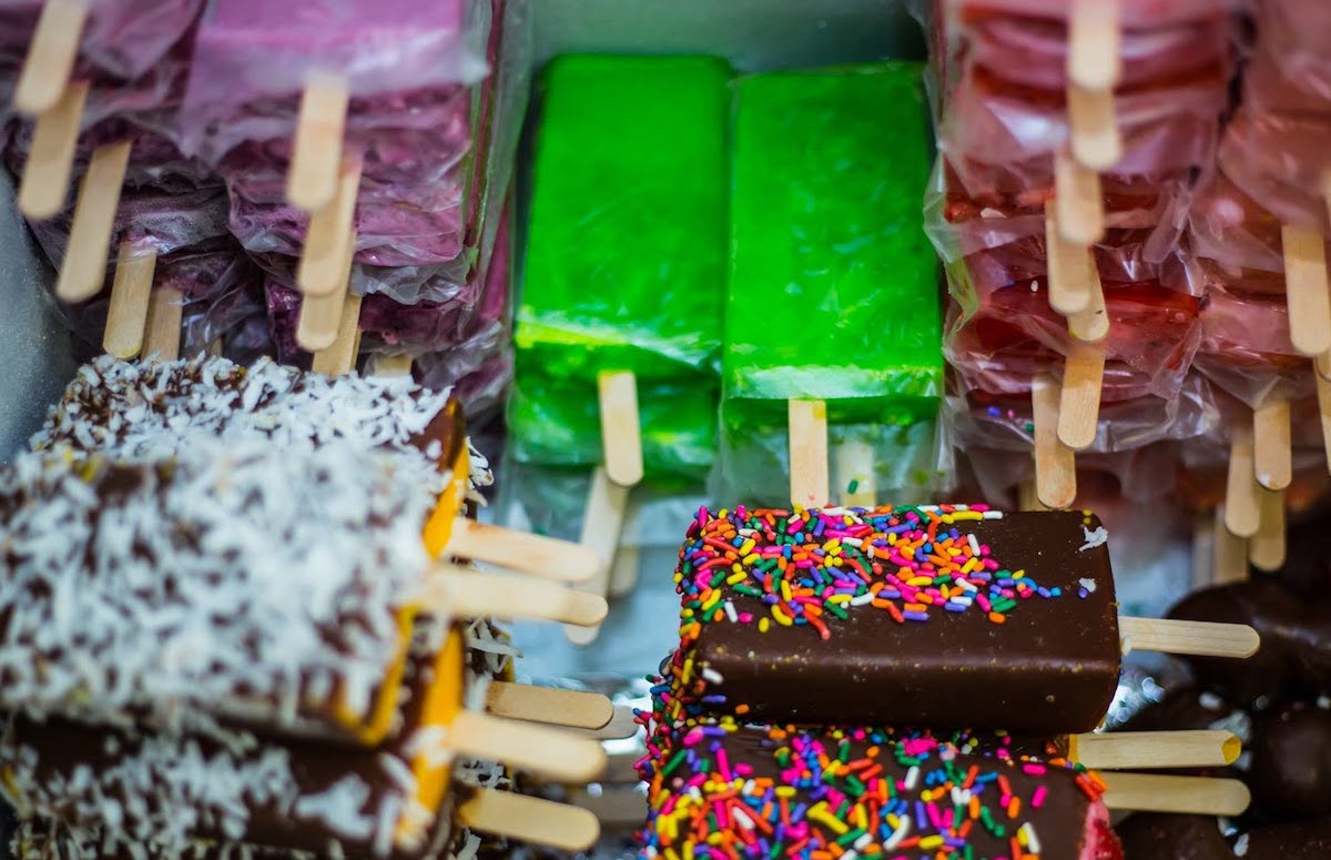 A colorful assortment of fruit, cream, and chocolate-dipped paletas at Mangolandia. | Photo by Mangolandia