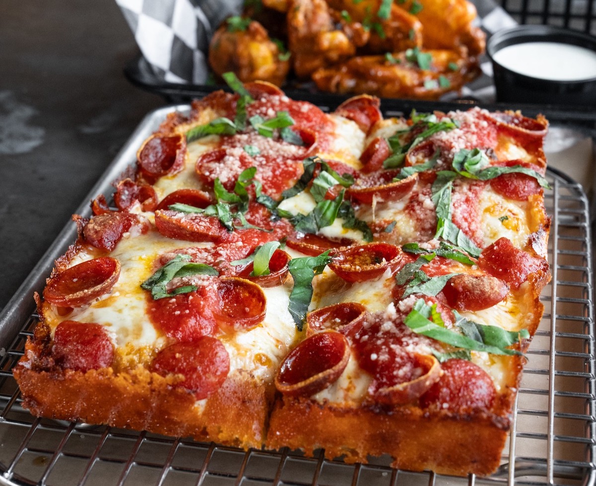 Detroit-style pie with wings at Thunderbird Pies. | Photo by Thunderbird Pies