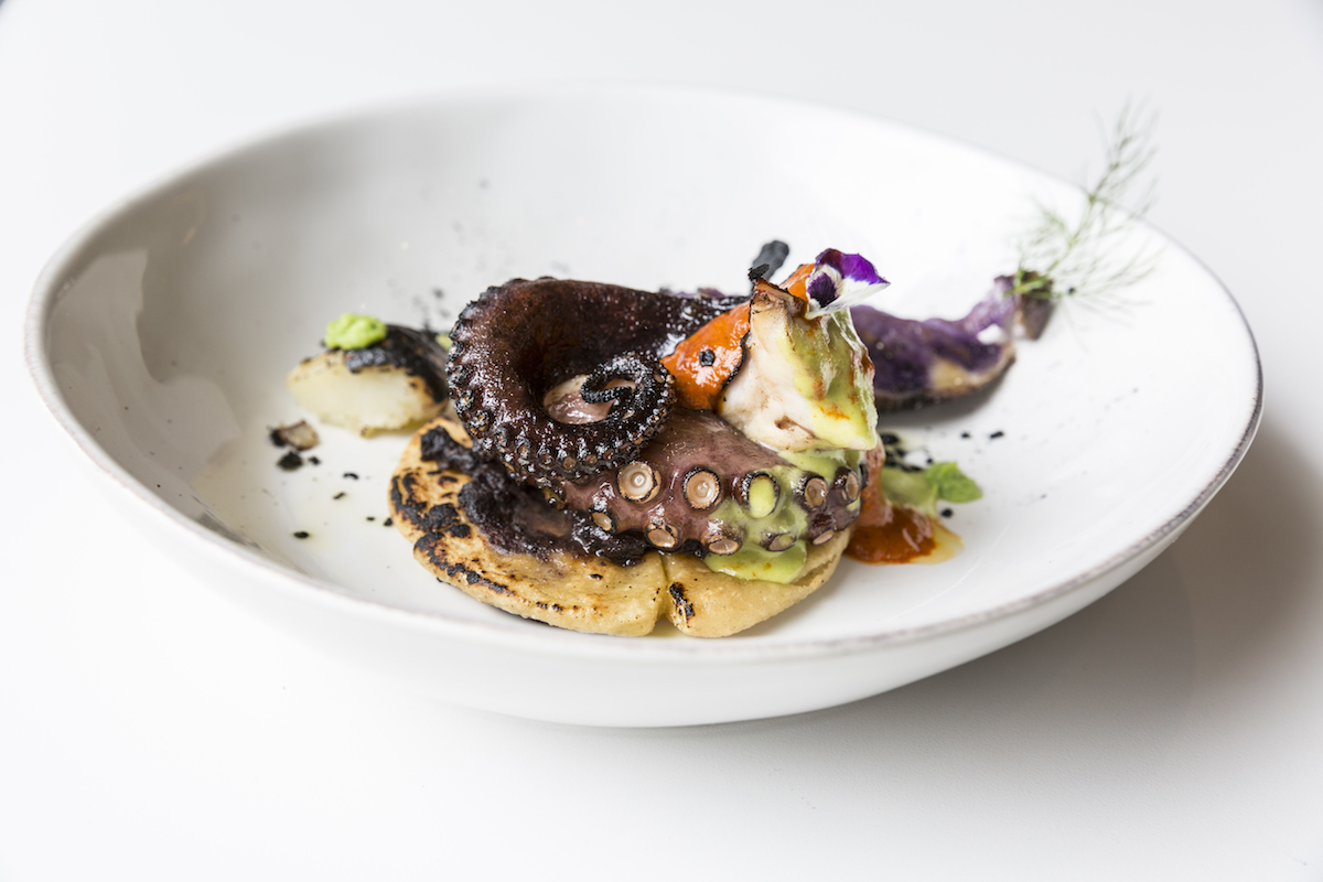 Xochi’s wood-roasted octopus showcases the bold Mexican flavors that have made the Downtown Houston restaurant a favorite for locals and visitors alike.| Photo by Julie Soefer