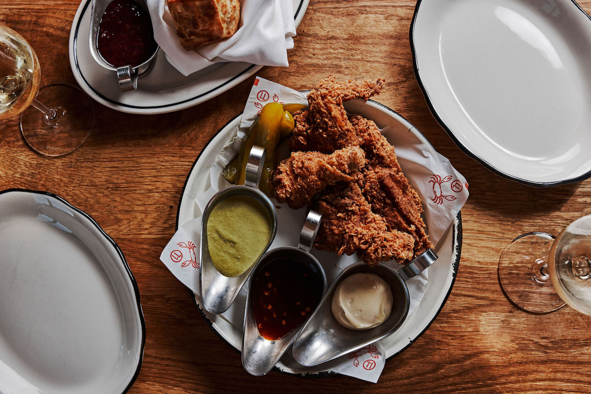 La Lucha’s fried chicken platter, available as a half bird, has been a signature dish since Day 1. | Photo by Andrew Thomas Lee