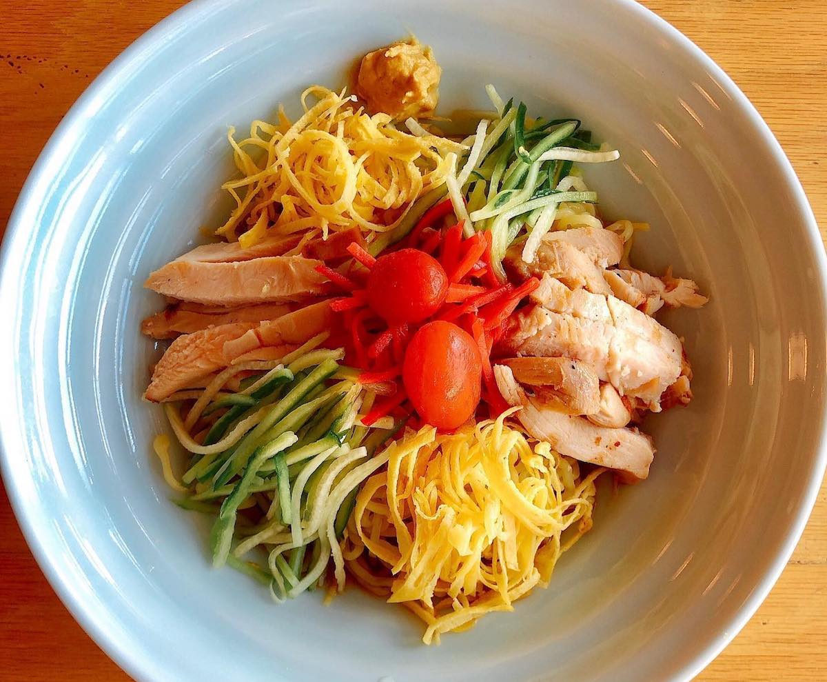 Chilled soupless ramen with cucumber, egg, benishoga, and shredded chicken chashu at Ichigoh Ramen Lounge. | Photo by Ichigoh Ramen Lounge