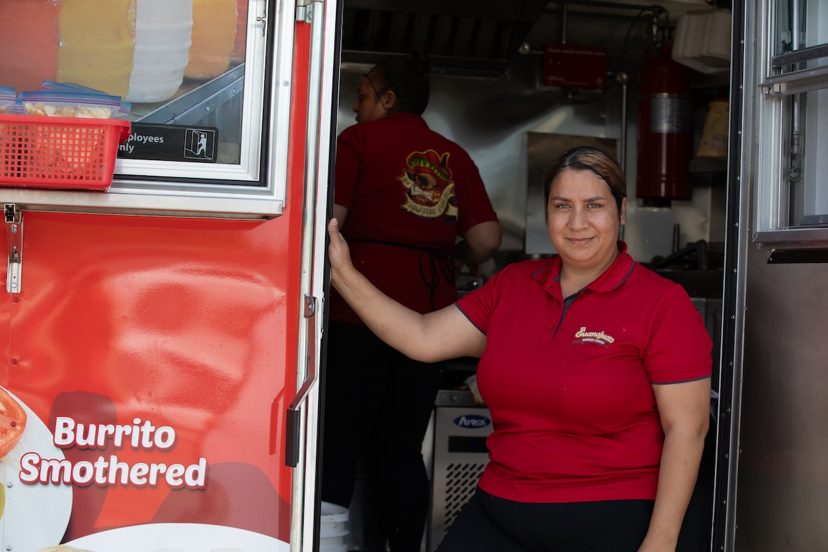 - DiningOut A food truck worker stands by her food truck, one of many vendors who sells Superior Farms meat. | Photo by Katrina Hajagos