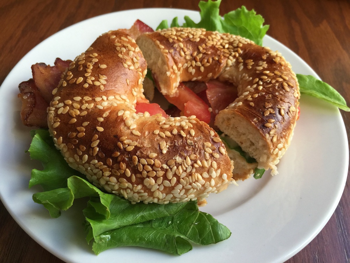 A deli sandwich built on a sesame bagel at 4 Brothers NY Bagels. | Photo by 4 Brothers NY Bagels