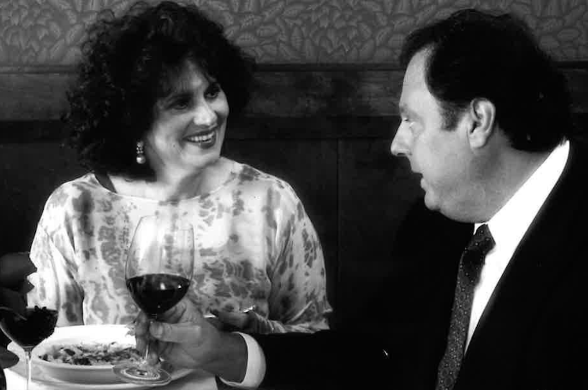Archival photo of Donna and Tony Vallone sharing dinner at Tony's. | Photo by Tony's