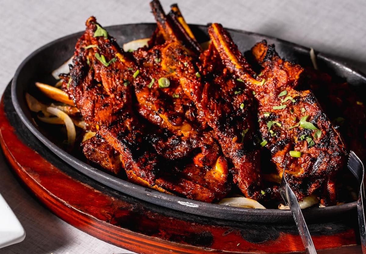 crabs - DiningOut The famed goat chops at Aga's. | Photo by Aga's