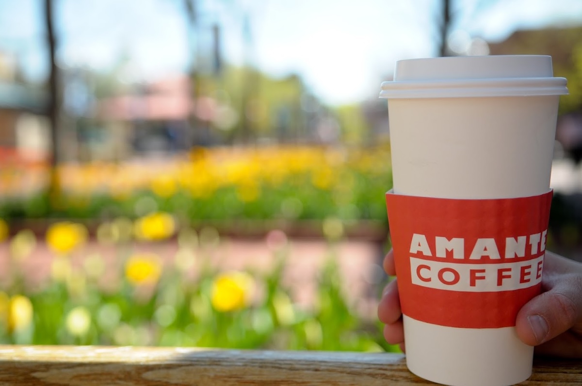 Grab a cup of coffee and enjoy the nice weather this summer. | Photo by Amante 