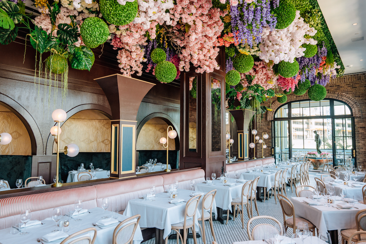 Annabelle's light-filled dining room bedecked with blooms. | Photo by Berg Hospitality