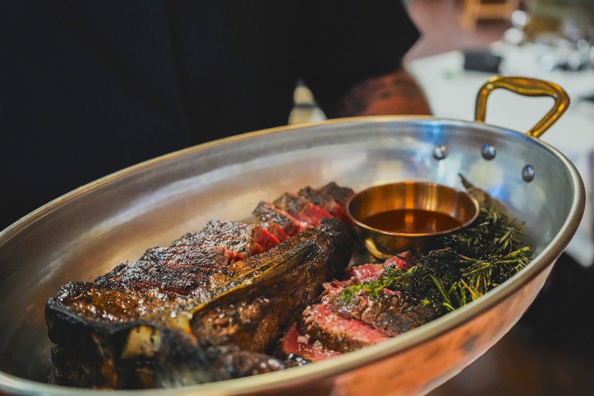 The 32-ounce Prime Black Angus Bistecca at BAR-Ranch Steak Company showcases a filet and NY strip side by side. | Photo by BAR-Ranch Steak Company