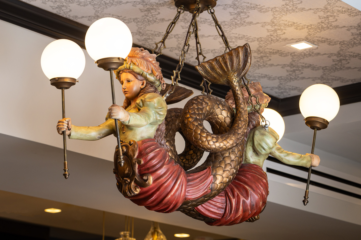 The mermaid lights at Brennan's Courtyard Bar are a recreation of ones lost in the restaurant's 2008 fire. | Photo by Andrew Hemingway