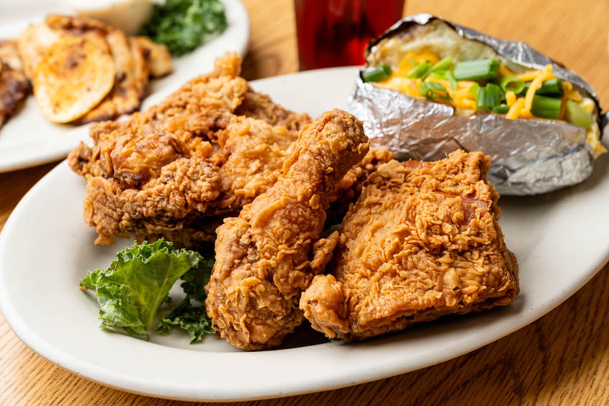 Fried chicken and a baked potato at Barbecue Inn. | Photo by Barbecue Inn