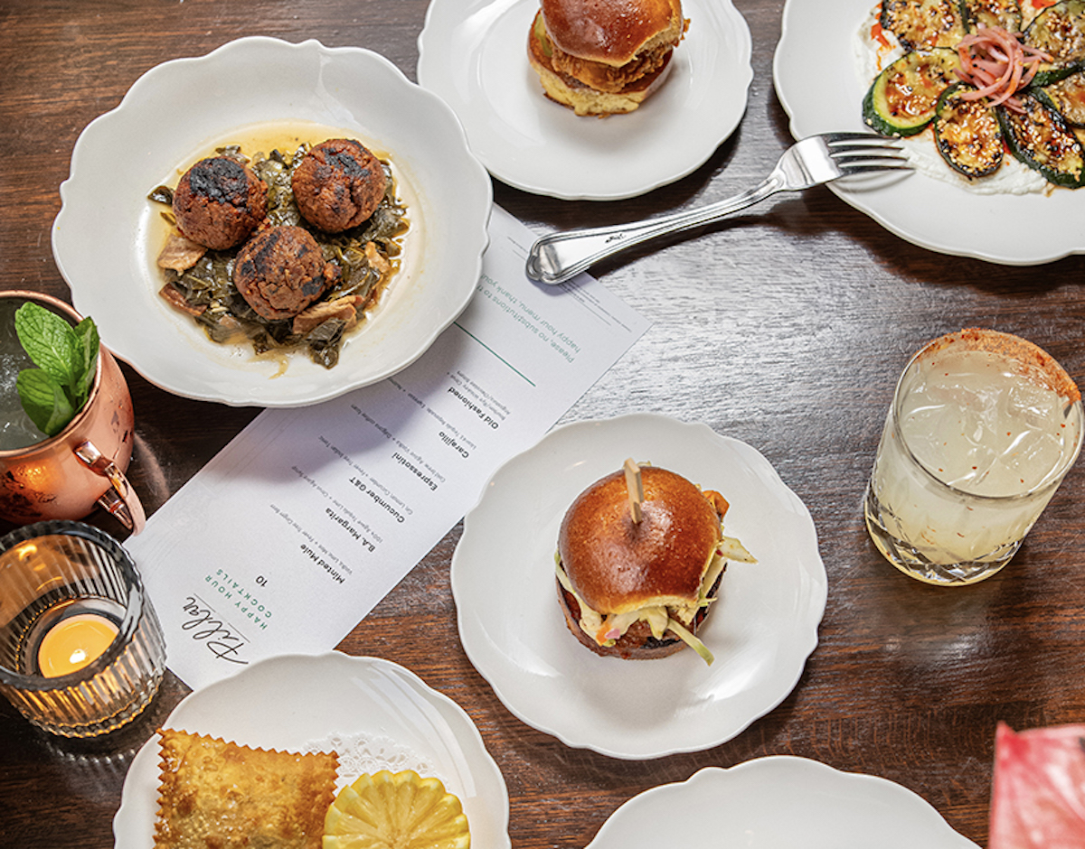 A spread of dishes at Pillar. | Photo by Adriana Herrera