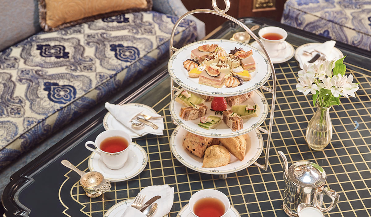 - DiningOut brown palace afternoon tea service with tea and tea tray