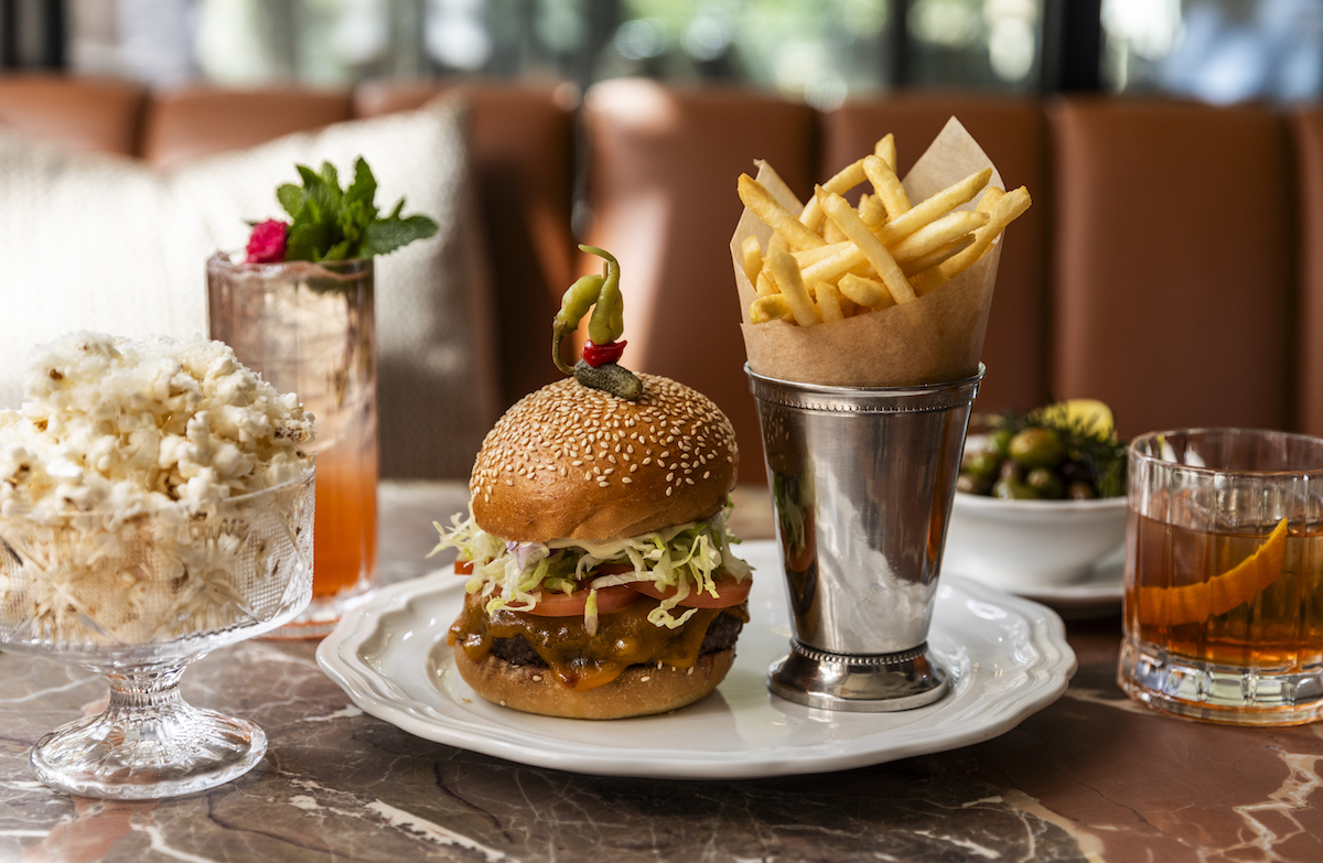 The Remi burger and fries at Remi. | Photo by Julie Soefer