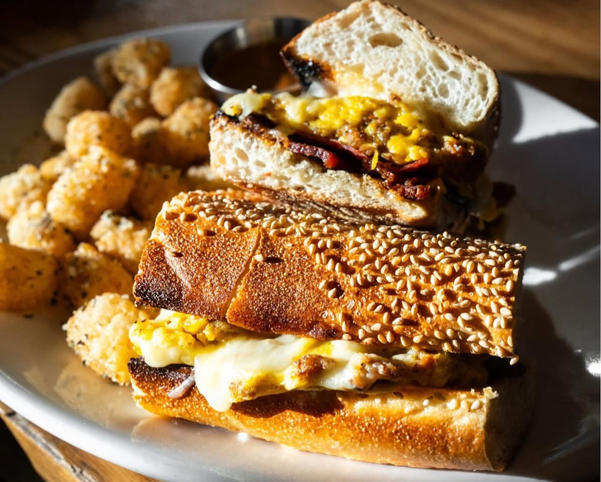 The breakfast sandwich on a sesame hoagie bun at Cane Rosso. | Photo by Cane Rosso