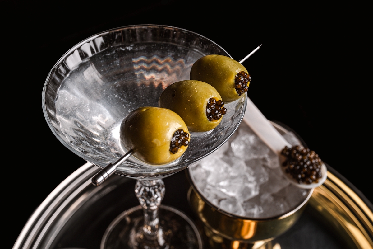 - DiningOut A Dirty Martini with caviar-stuffed olives is an appropriate libation for enjoying Caspian's Cocktails & Caviar at Caesars Palace. |
Photo by Jose Salinas