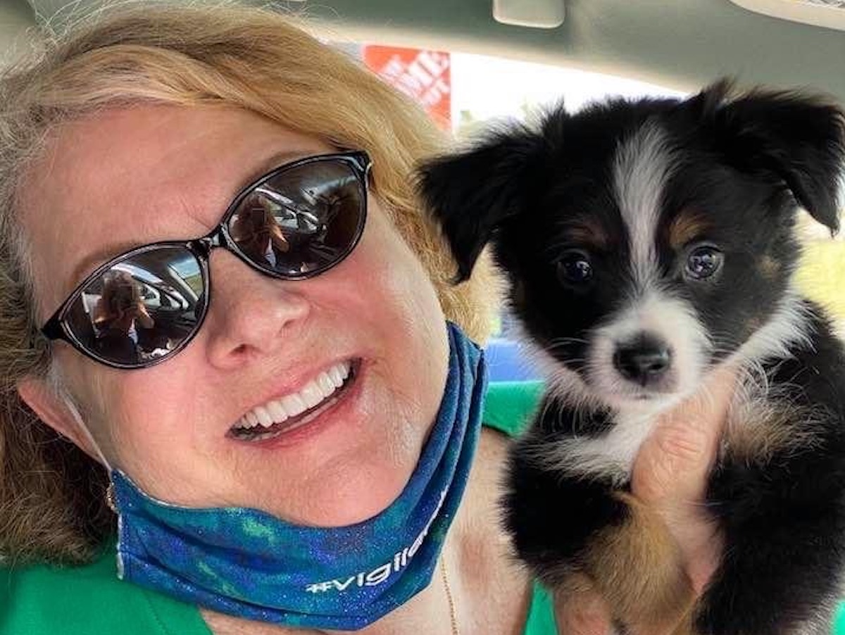 - DiningOut Cathy Bonner, co-owner of Mod Hotels, with her puppy Sam. | Photo courtesy of Cathy Bonner