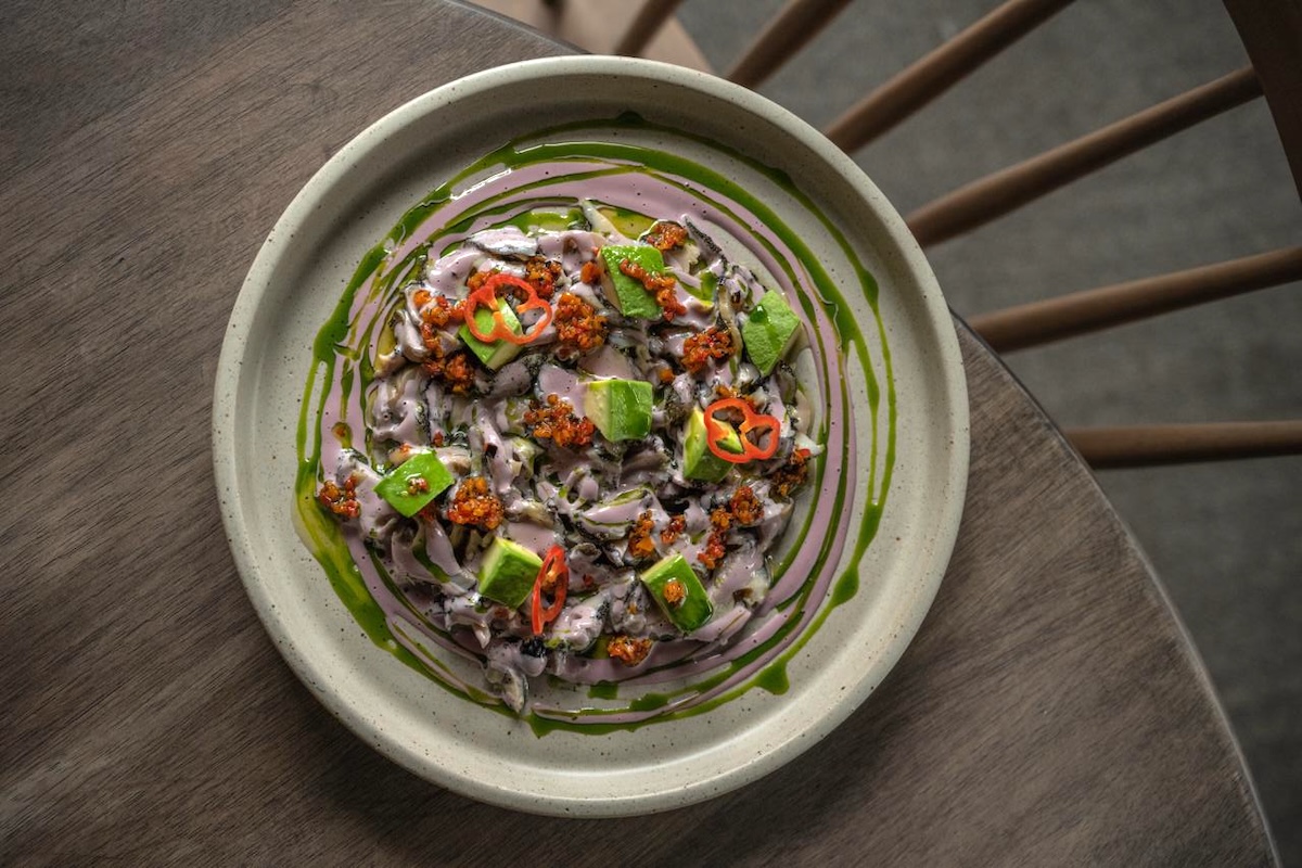 The menu at Cimera features pan-Latin food, such as Clams al Olivio. | Photo by Luis Morales and Brandon Smith