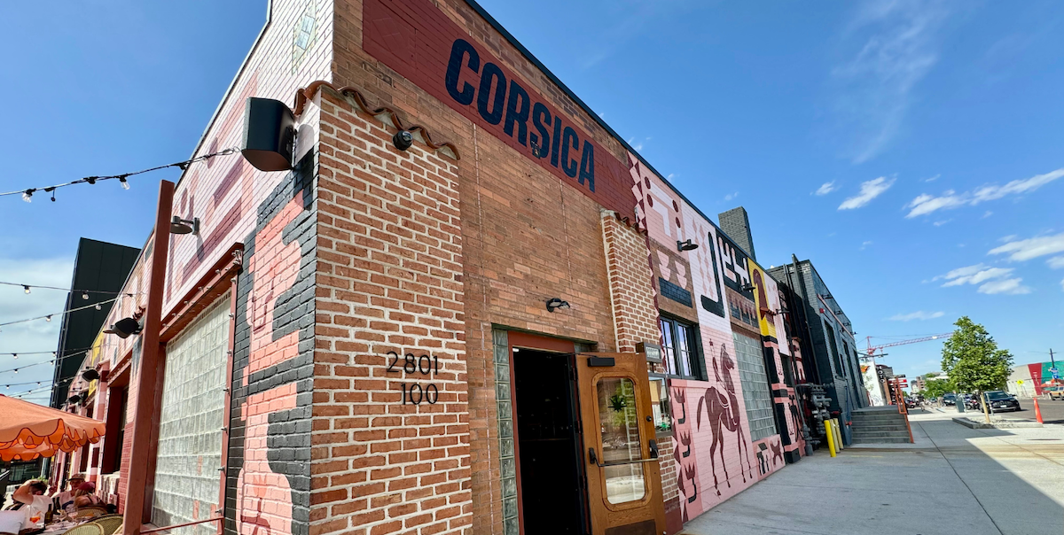 - DiningOut The murals on the Corsica building beckon. | Photo by Montana Rae