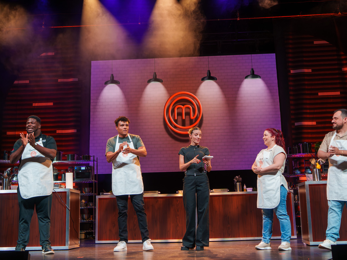 risotto-alla-milanese - DiningOut Michael Leonard, Gerron Hurt. Rachel Sanchez and Julio Figueredo onstage at MasterChef All Stars Live! | Photo by Stephen Cook (TCG Entertainment)