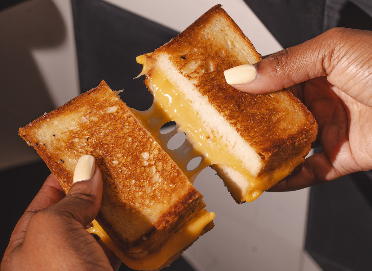 - DiningOut The grilled cheese sandwich on milk bread at Boo's Burgers. | Photo by Michael Anthony
