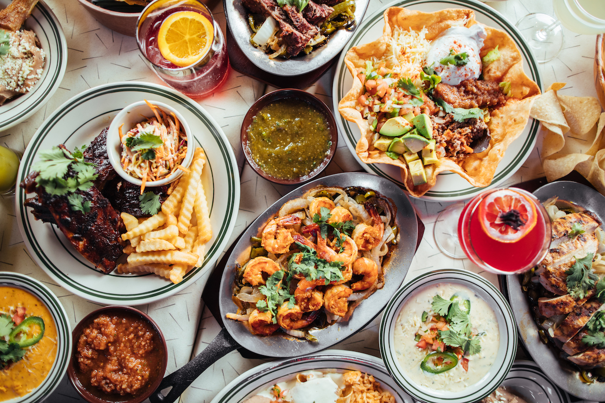 A spread of starters, entrees, and margaritas at Las Palmas. | Photo by Kathy Tran