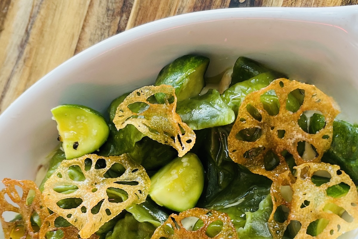 Dumplings and smashed cucumber from Pig and Tiger. | Photo by Alex Fitzgerald