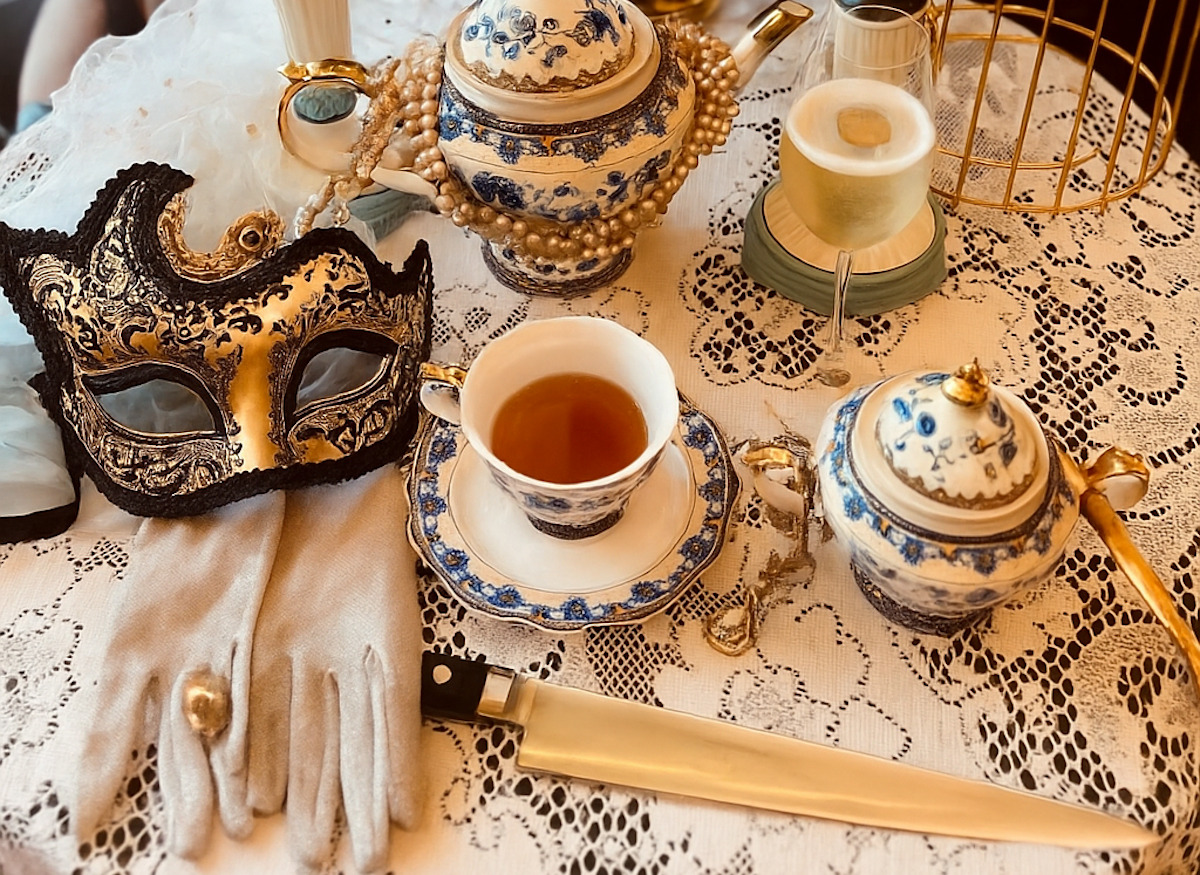The dramatic tablescape for Emma Jane's murder mystery dinner. | Photo by Emily Vitek