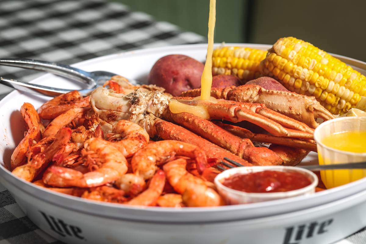 A seafood platter gets a buttery finish at Flying Fish. | Photo by Allison David