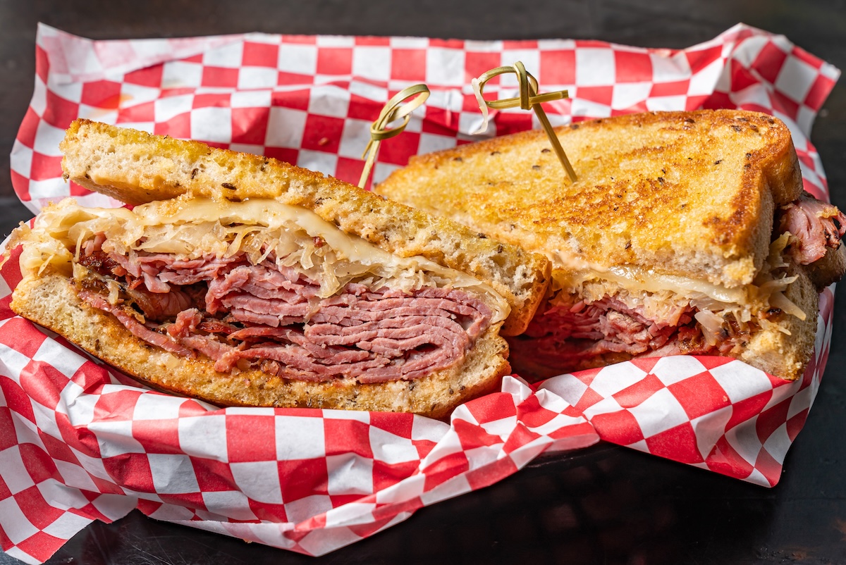 - DiningOut A corned beef Reuben sandwich is easy to find year round. | Photo by Fainting Goat Pub