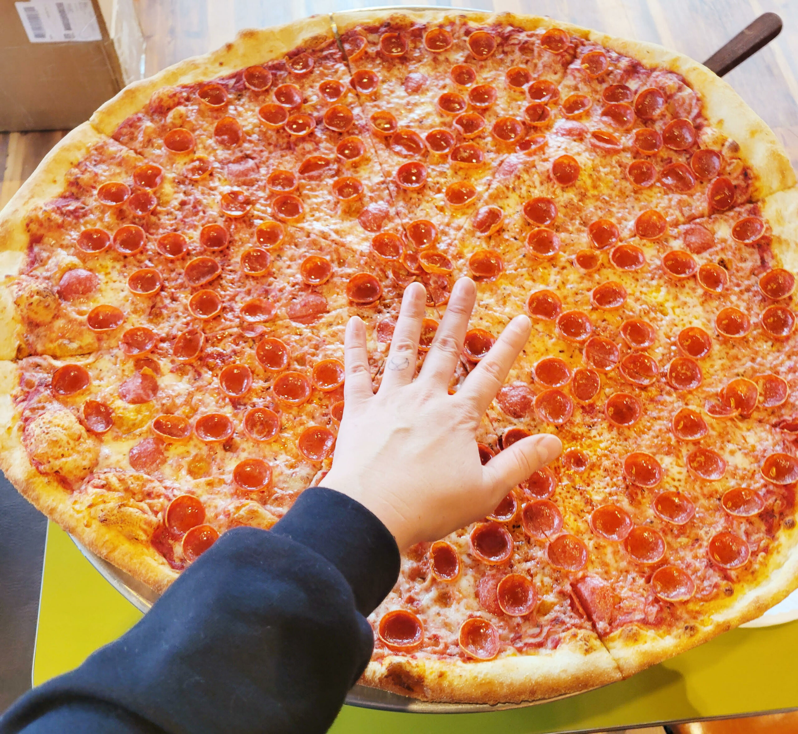 The giant pizza at Fat Sully's in Atomic Cowboy. | Photo by Linnea Covington