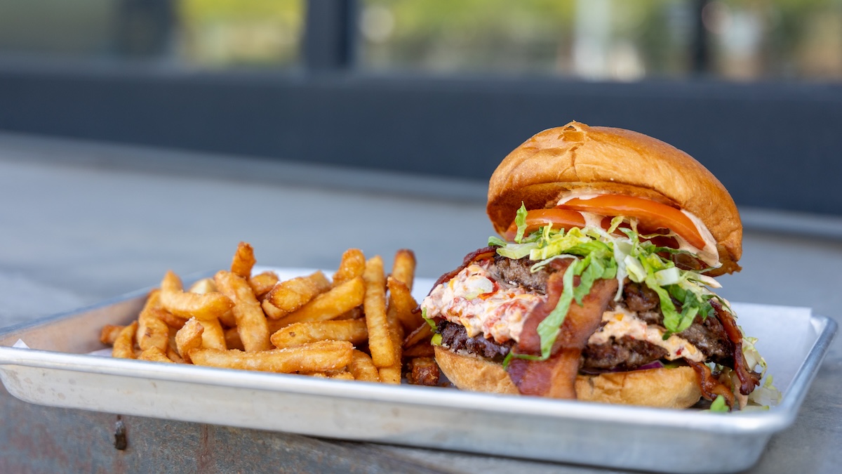 FlyteCo Tower in Denver serves up hearty burgers and fries for grownups, while kids get a pasta dish free on Wednesdays. | Photo by Linnea Covington