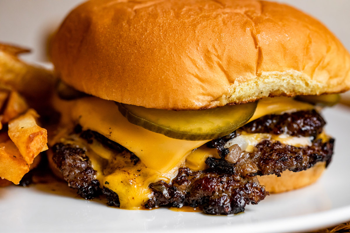 Graffiti Raw's smash burger pairs well with the restaurant's lively setting.|Photo by Kirsten Gilliam