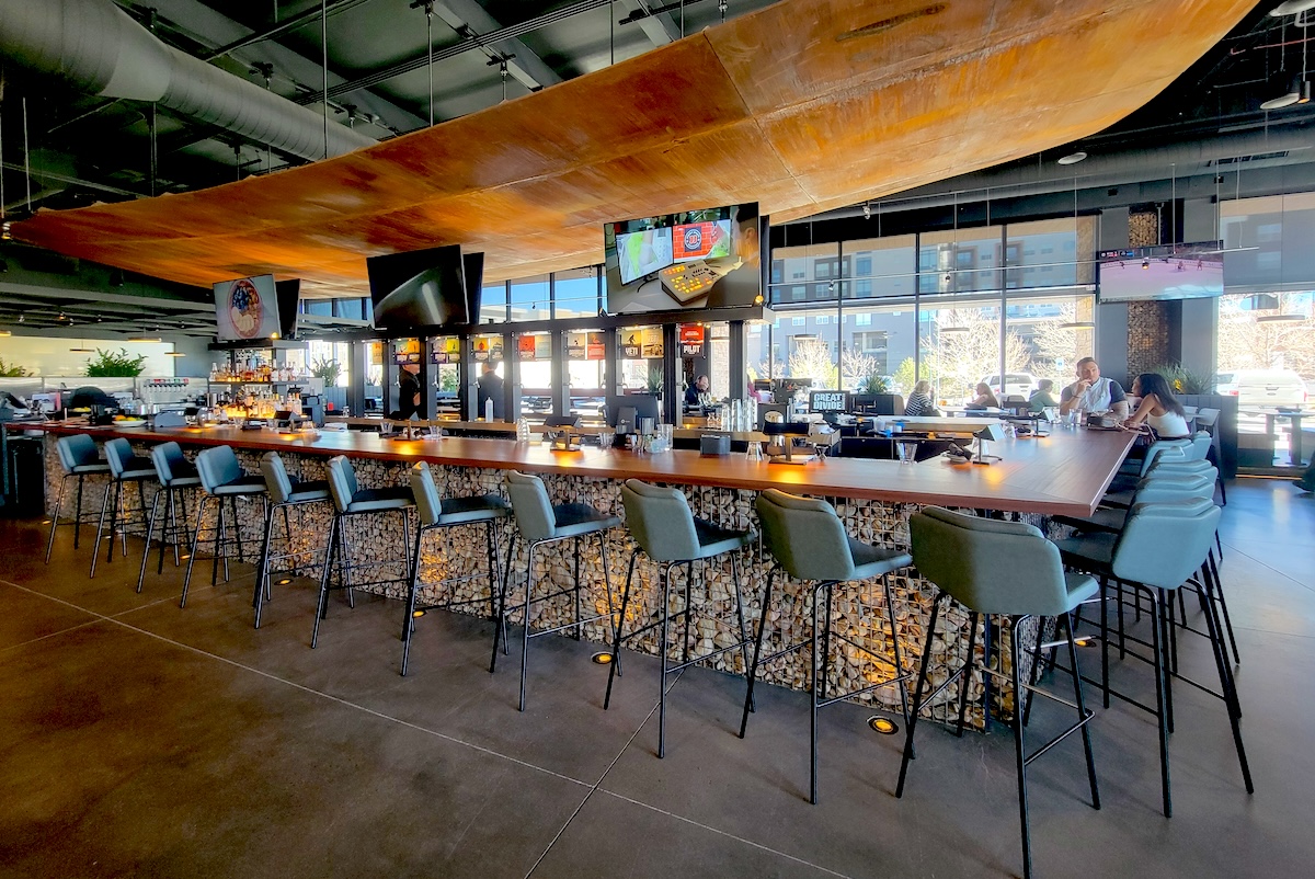 long bar with blue chairs
