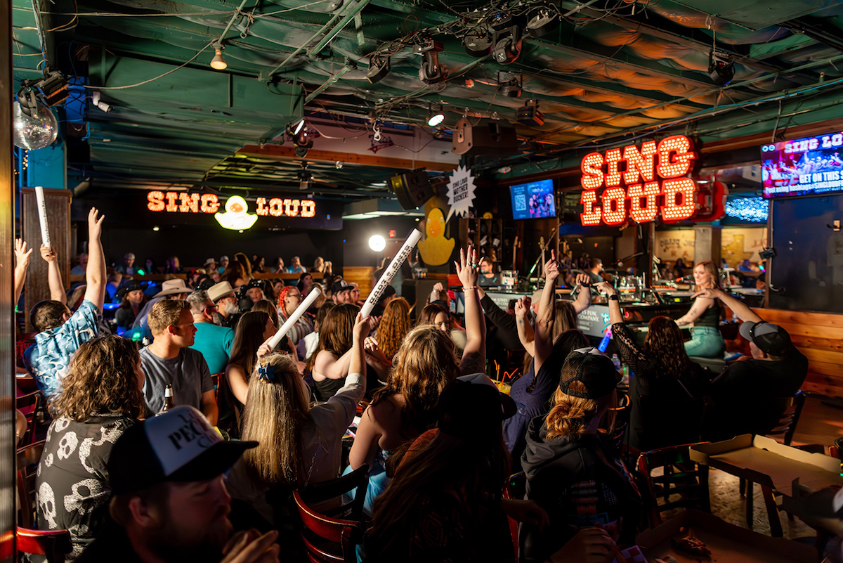- DiningOut The crowd cheers on performers at Pete's Dueling Piano Bar. | Photo by Pete's Dueling Piano Bar