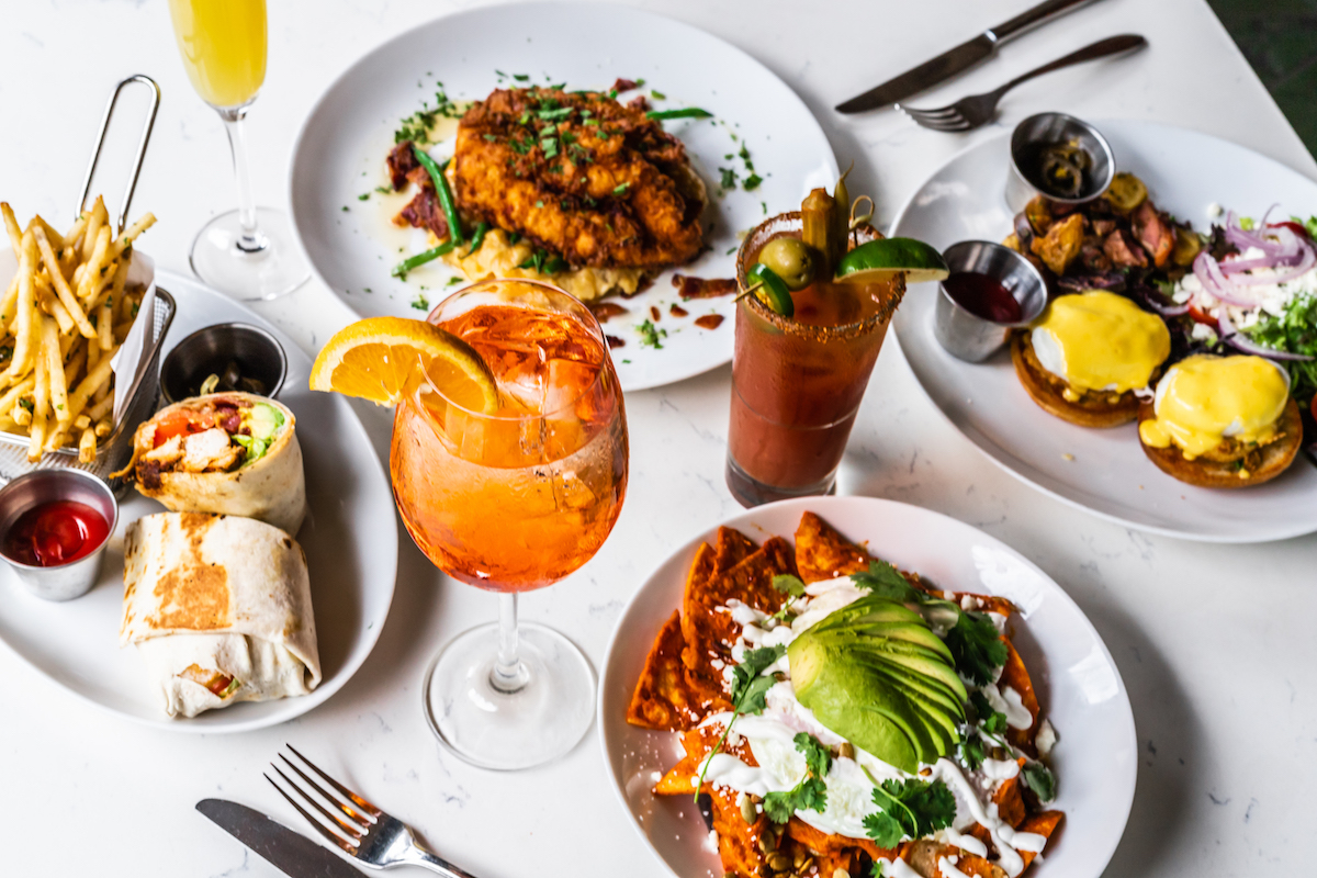 A spread of dishes and cocktails at Monarch at Hotel ZaZa. | Photo by Hotel ZaZa