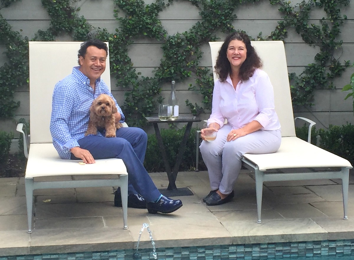 Hugo Ortega and Tracy Vaught, co-owners of H-Town Restaurant Group with their dog Coco. | Photo courtesy of Hugo Ortega