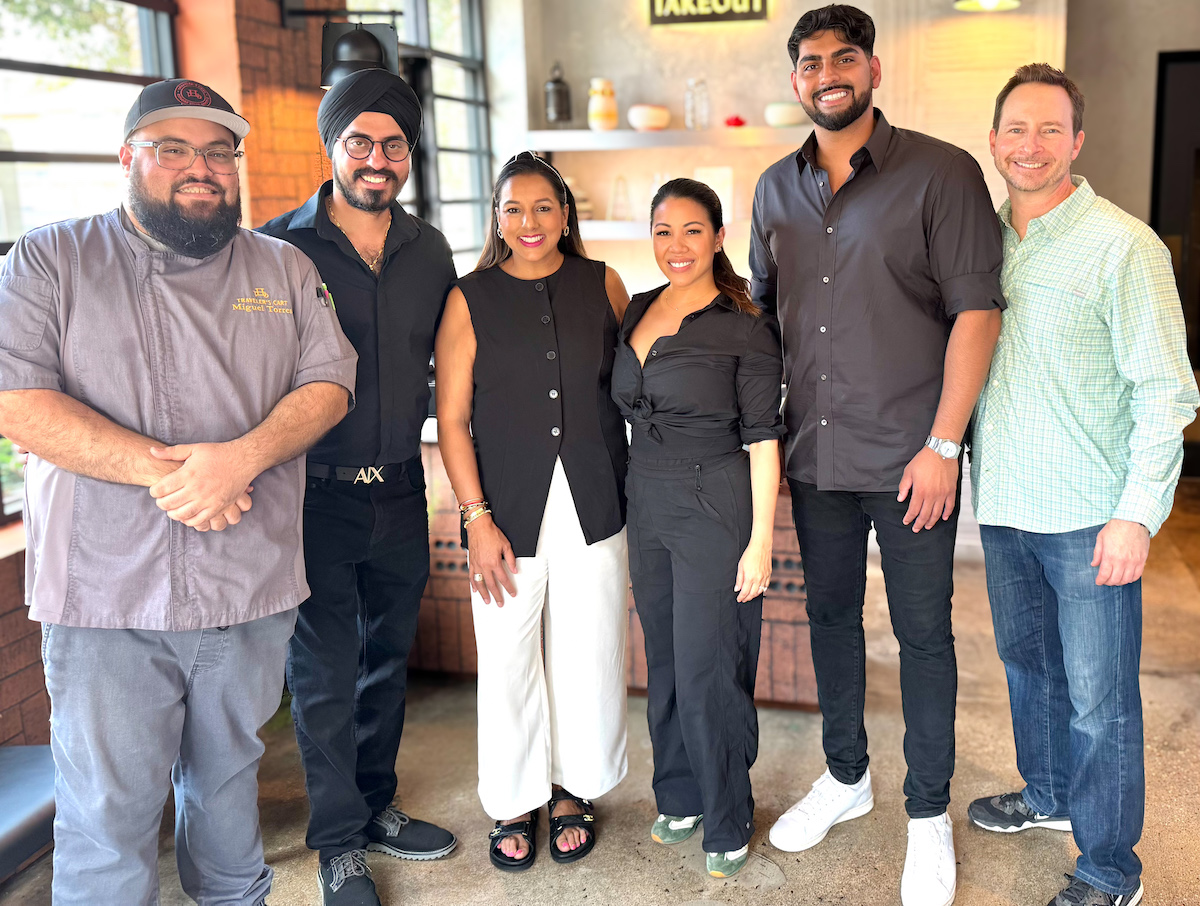 From left, Miguel Torres, chef at Traveler's Cart; Jassi Bindra, executive chef of Kahani Social Group; Sharan Gahunia of Raja Sweets; Thy Mitchell co-owner of Traveler's Cart; Preet Singh, co-founder of Kahani Social Group; and Matthew Mitchell, co-owner of Traveler's Cart. | Photo by Traveler's Cart