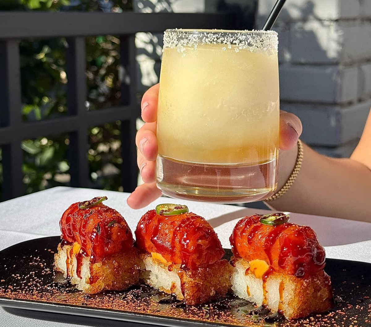 A perfect summer pairing of spicy tuna crispy rice with a frozen margarita at Anchor Sushi Bar. | Photo by Anchor Sushi Bar