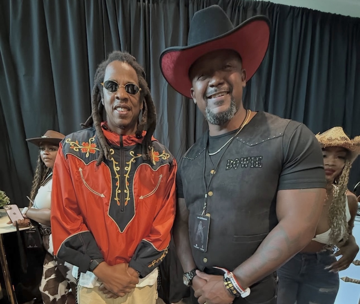 Jay-Z poses with chef Don Bowie of Taste Kitchen + Bar. | Photo by JRMH Photos