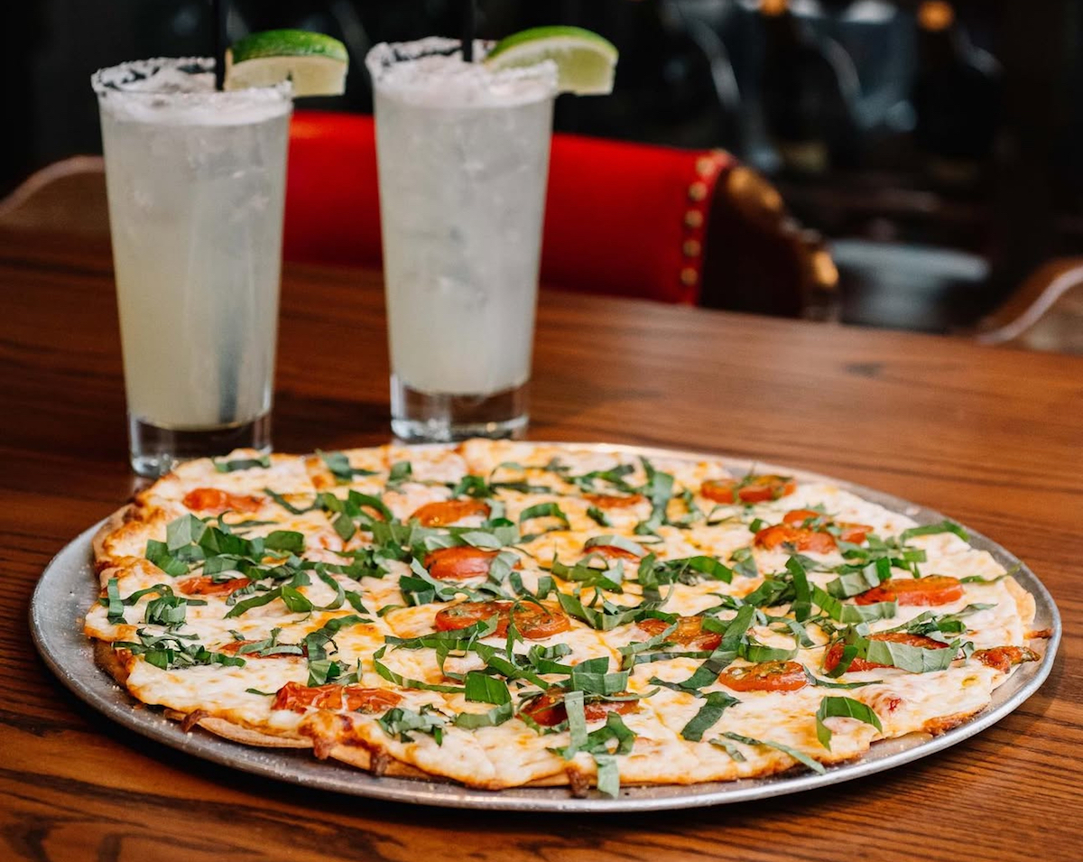 - DiningOut Cracker-thin crust at Eno's Pizza Tavern. | Photo by Eno's Pizza Tavern