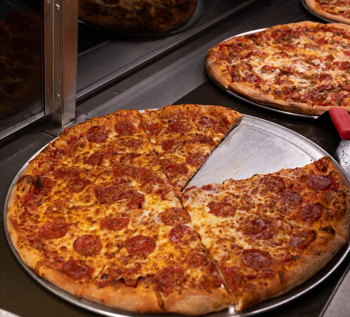 A lineup of pizzas by the slice at Frank's Pizza. | Photo by Frank's Pizza