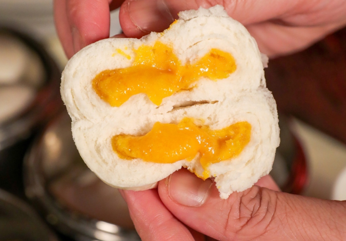 - DiningOut Salted egg custard bun at Zhang's Kitchen. | Photo by Zhang's Kitchen