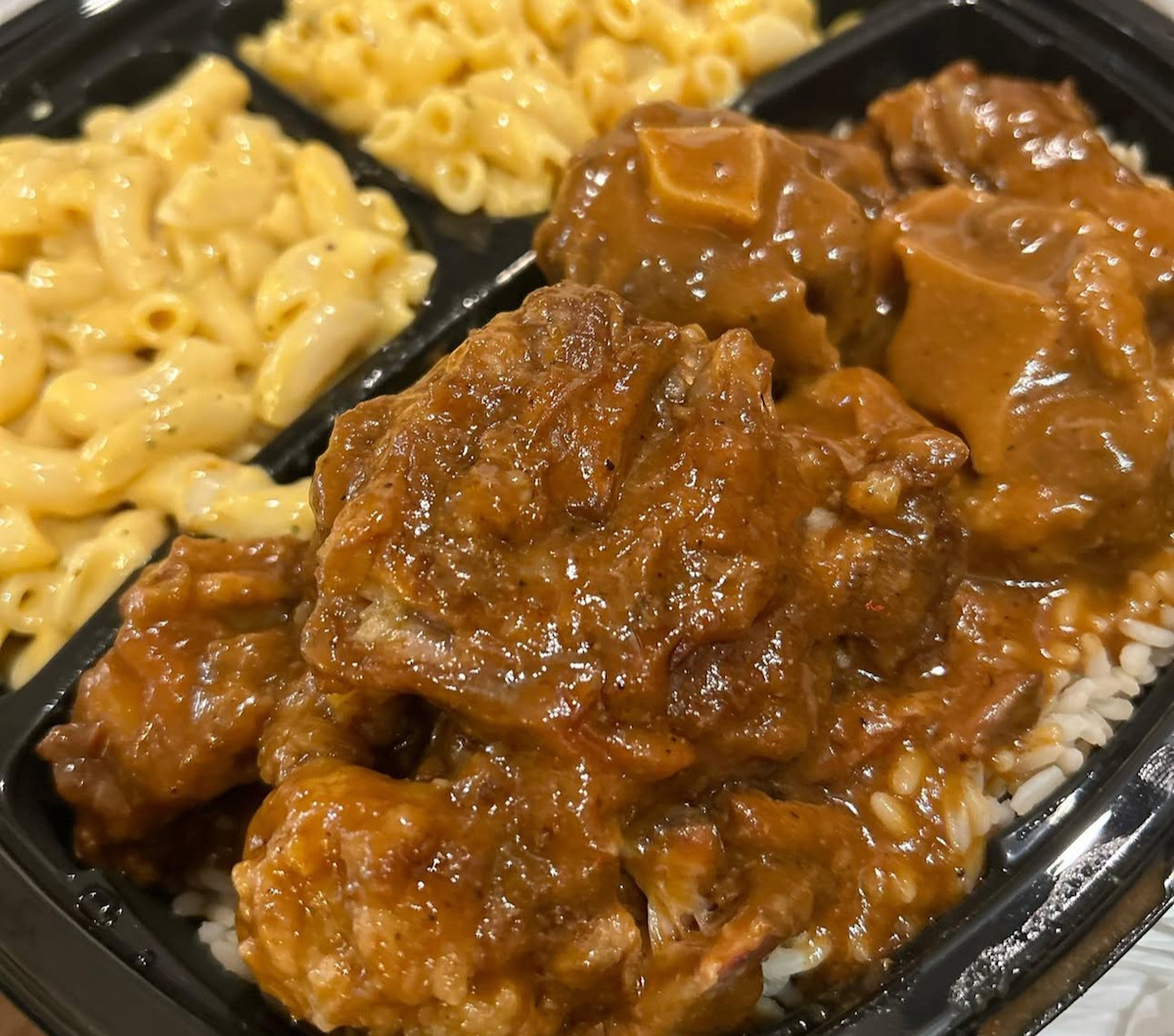 Oxtails and macaroni and cheese at Esther's Cajun Cafe & Soul Food. | Photo by Esther's Cajun Cafe & Soul Food