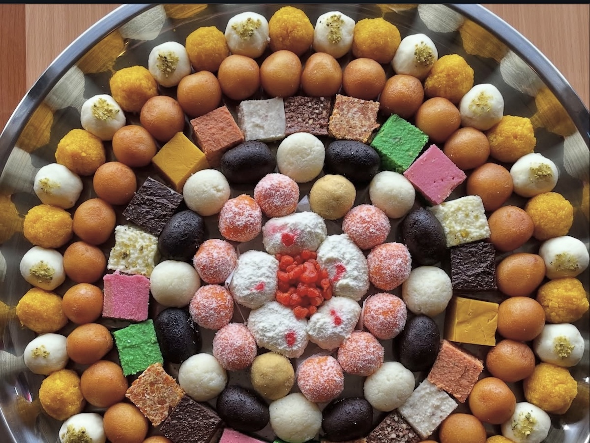 - DiningOut A platter of mithai from Raja Sweets. | Photo by Raja Sweets