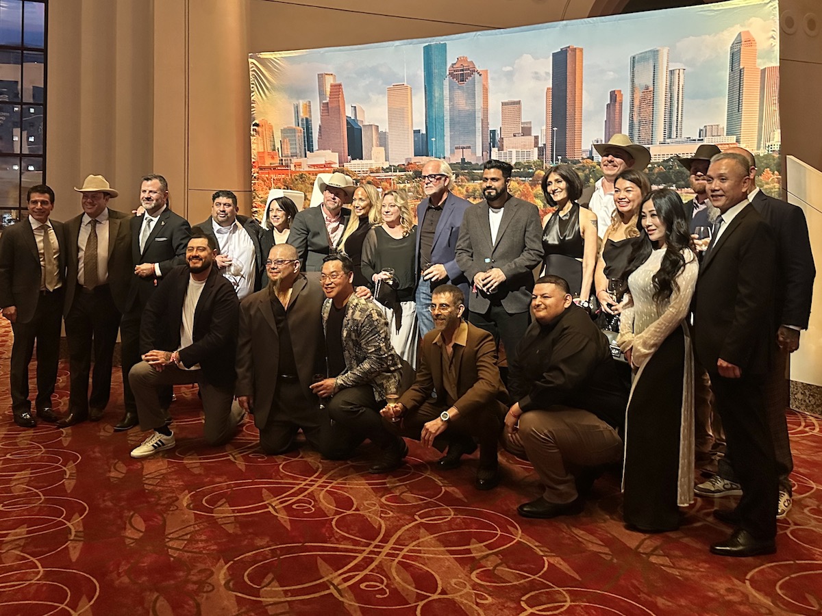 Houston honorees pose in the Wortham Theater's grand lobby before the 2025 Michelin Guide Texas awards ceremony. | Photo by Megha McSwain