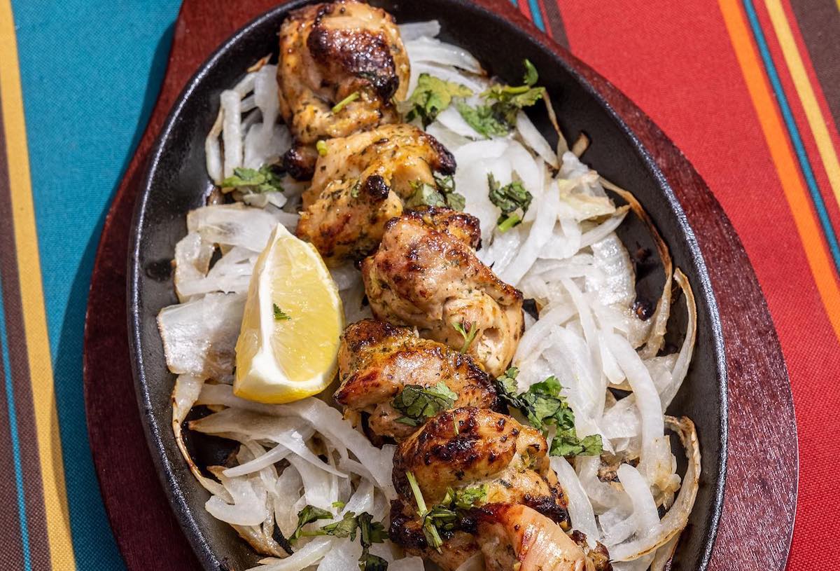 alaska-pollock - DiningOut A sizzling chickn platter at Karahi Boys. | Photo by Karahi Boys