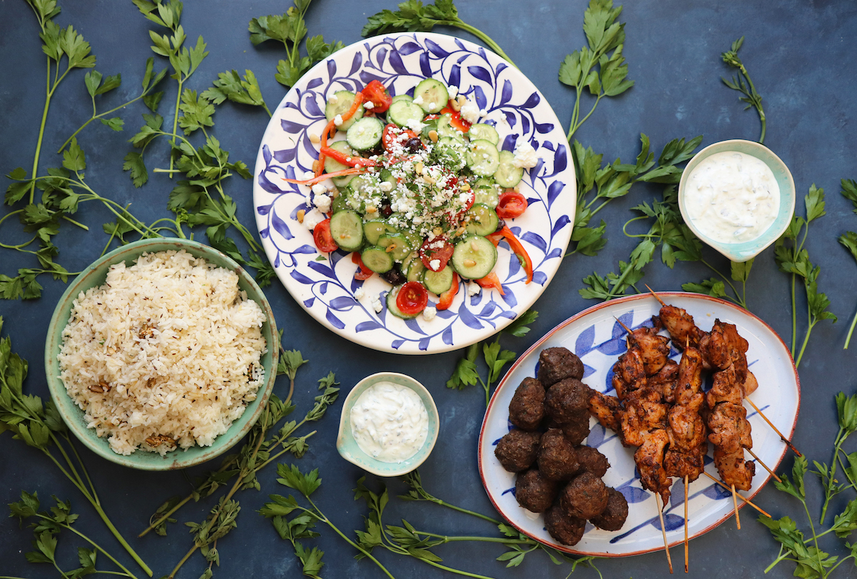 Salads, meats, and rice at Kriti Kitchen. | Photo by Kriti Kitchen