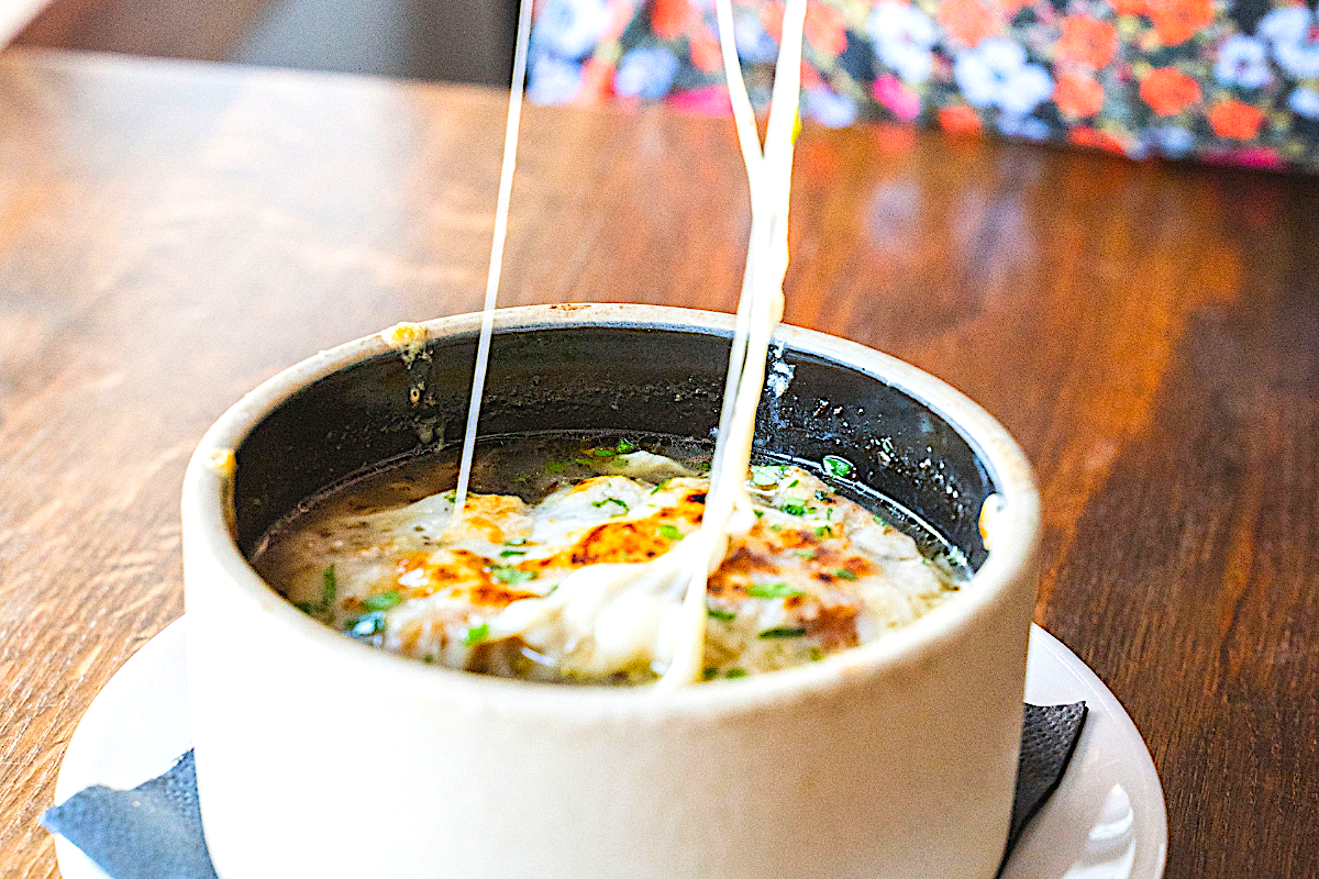 Traditional onion soup at Le French. | Photo by Stephanie Kelly