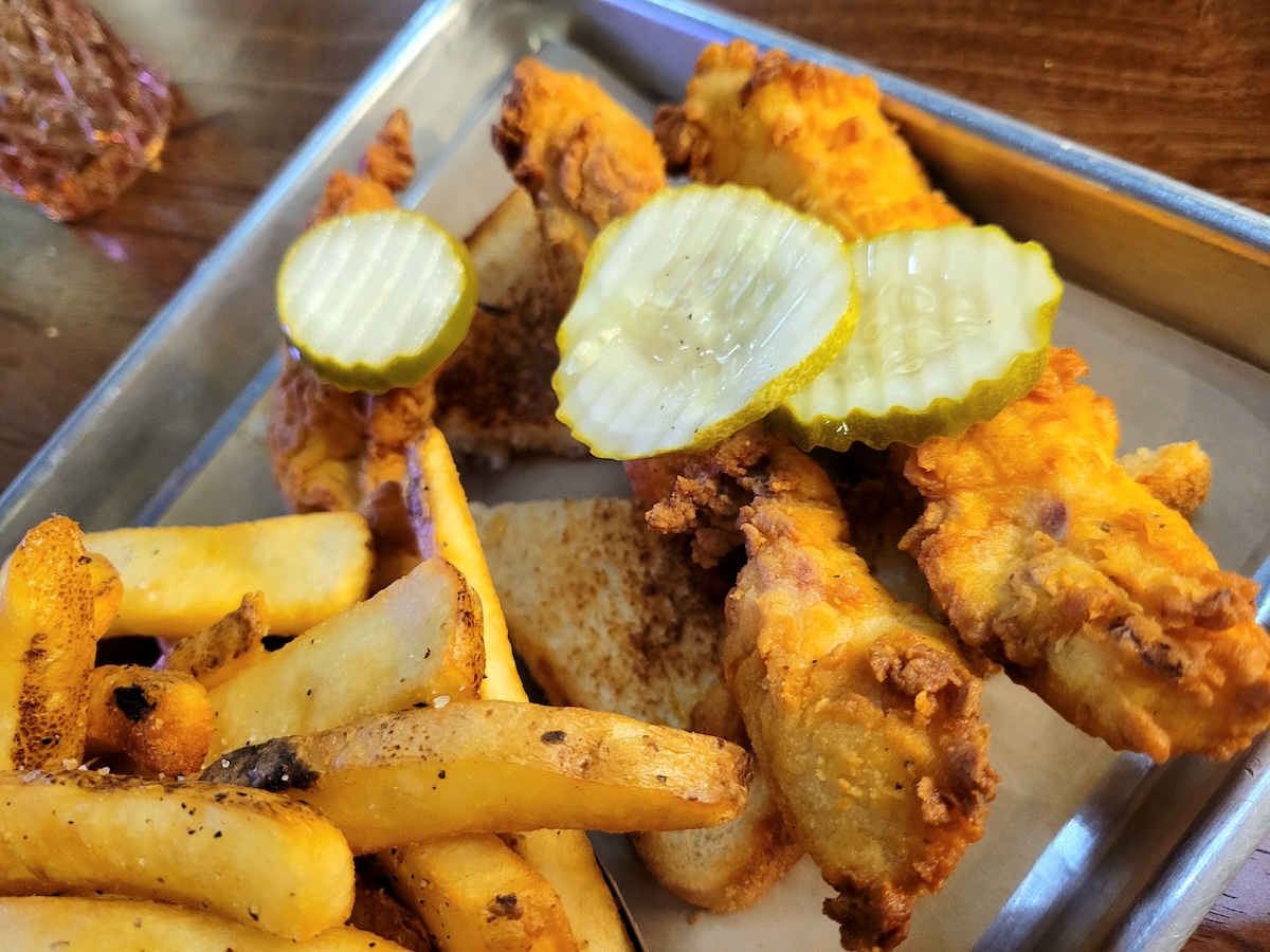 Lou's Hot and Naked in Milk Market makes some spicy chicken tendies. | Photo by Linnea Covington